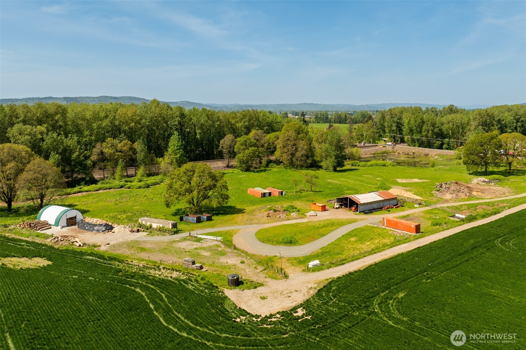 0 Whalen Road Woodland, WA 98674 - Photo 8 of 26 a view of a swimming pool and trees in the background