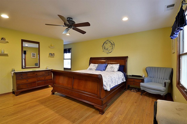 1616 South Tyler Road St. Charles, IL 60174 - Photo 12 of 25 a bedroom with a bed and furniture