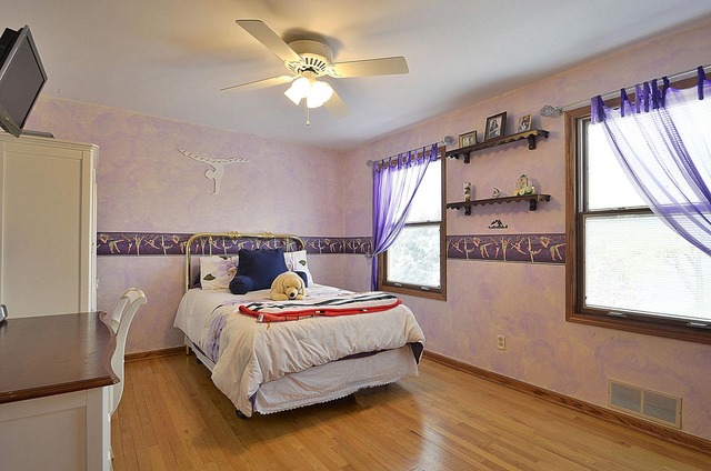 1616 South Tyler Road St. Charles, IL 60174 - Photo 14 of 25 a bedroom with bed and window