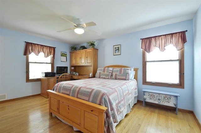 1616 South Tyler Road St. Charles, IL 60174 - Photo 15 of 25 a bedroom with a bed and window