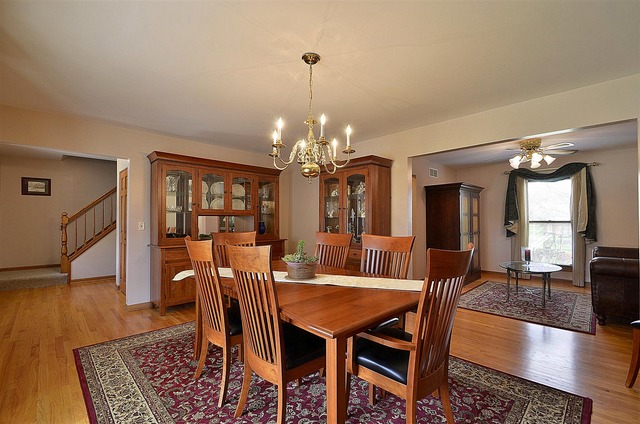 1616 South Tyler Road St. Charles, IL 60174 - Photo 3 of 25 a view of a dining room with furniture and wooden floor
