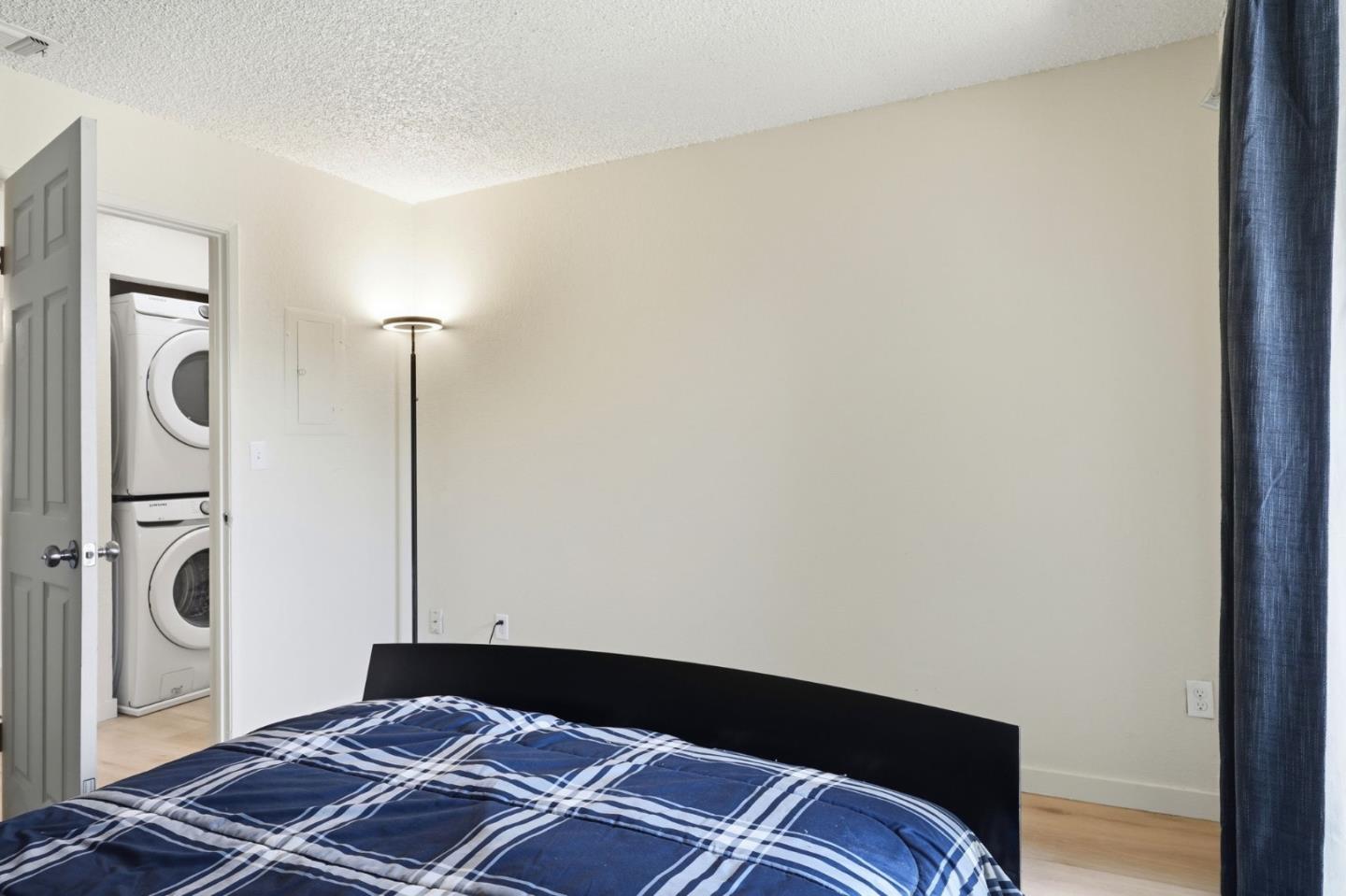 7283 Florin Road, Unit 8 Sacramento, CA 95828 - Photo 24 of 35 a bedroom with a bed and a window