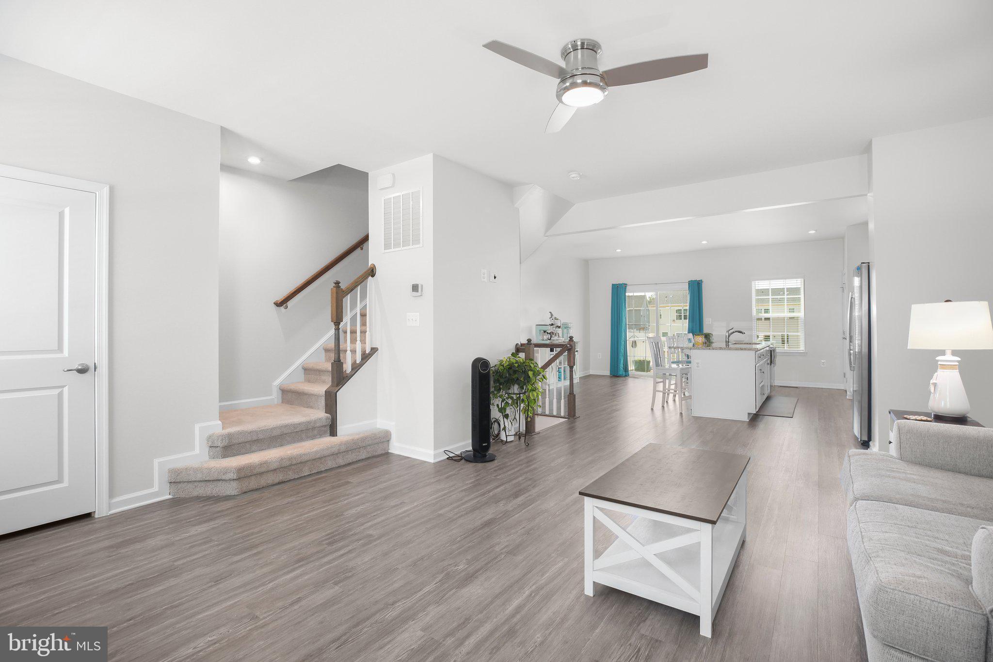 8410 Devries Lane Spotsylvania, VA 22553 - Photo 11 of 32 a living room with furniture and wooden floor