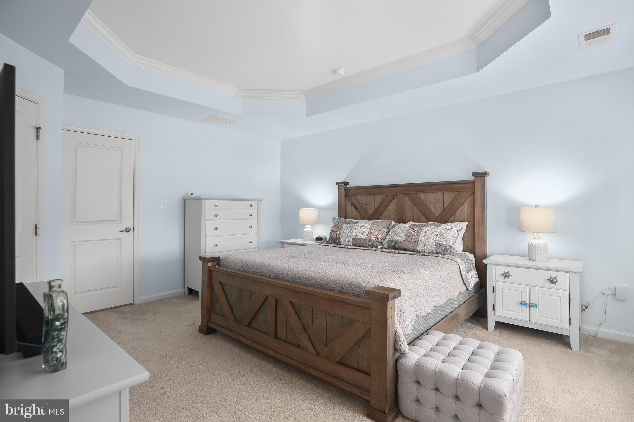 8410 Devries Lane Spotsylvania, VA 22553 - Photo 16 of 32 a bedroom with a bed and a cabinets