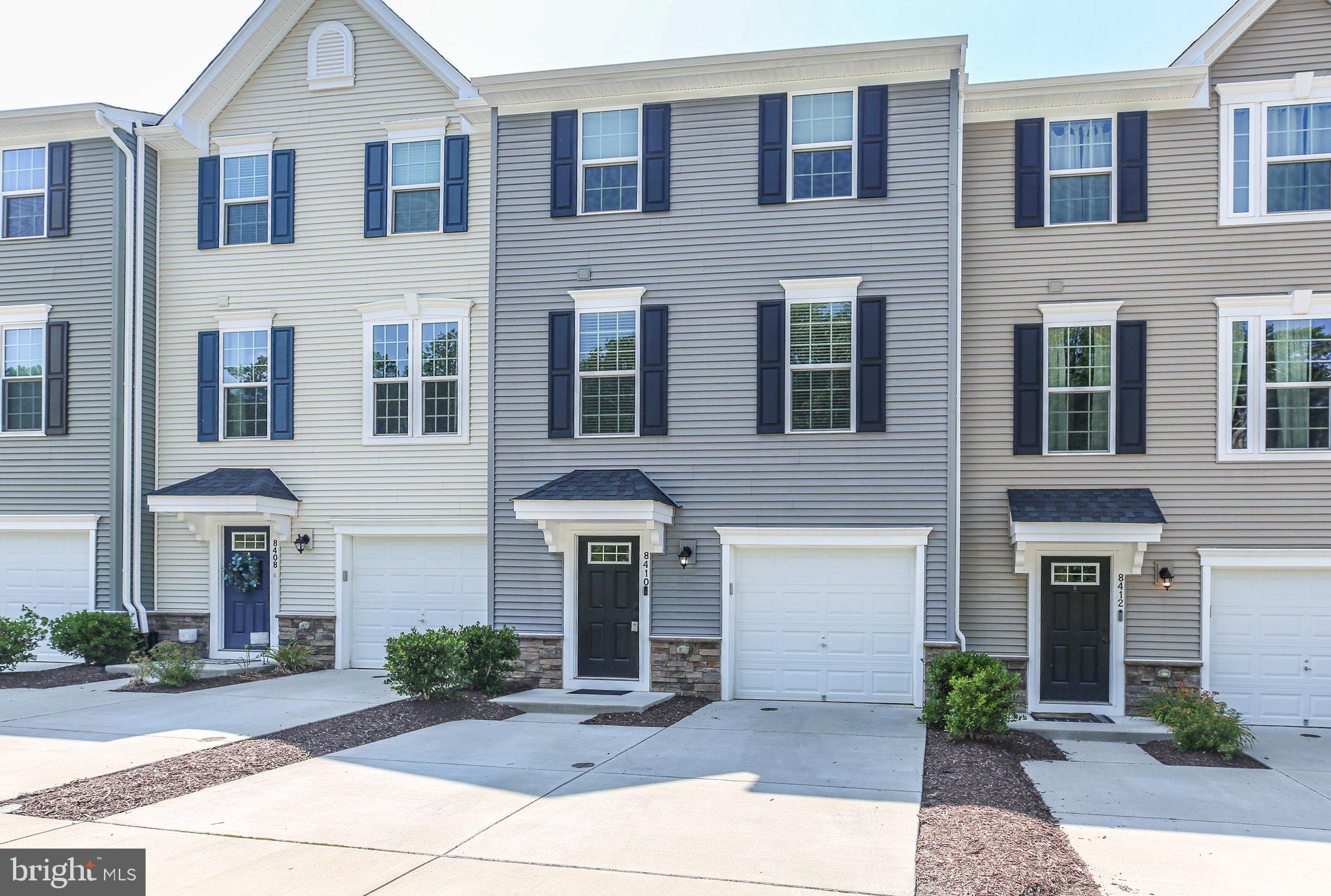 8410 Devries Lane Spotsylvania, VA 22553 - Photo 2 of 32 a front view of a house with yard