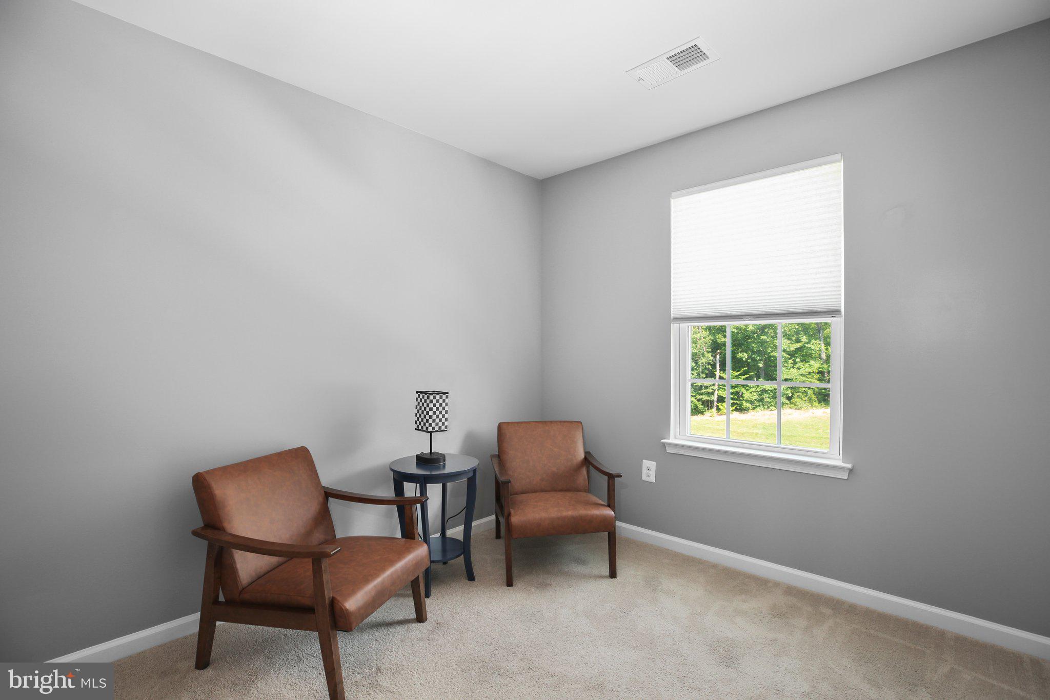 8410 Devries Lane Spotsylvania, VA 22553 - Photo 26 of 32 a work room with furniture and a window