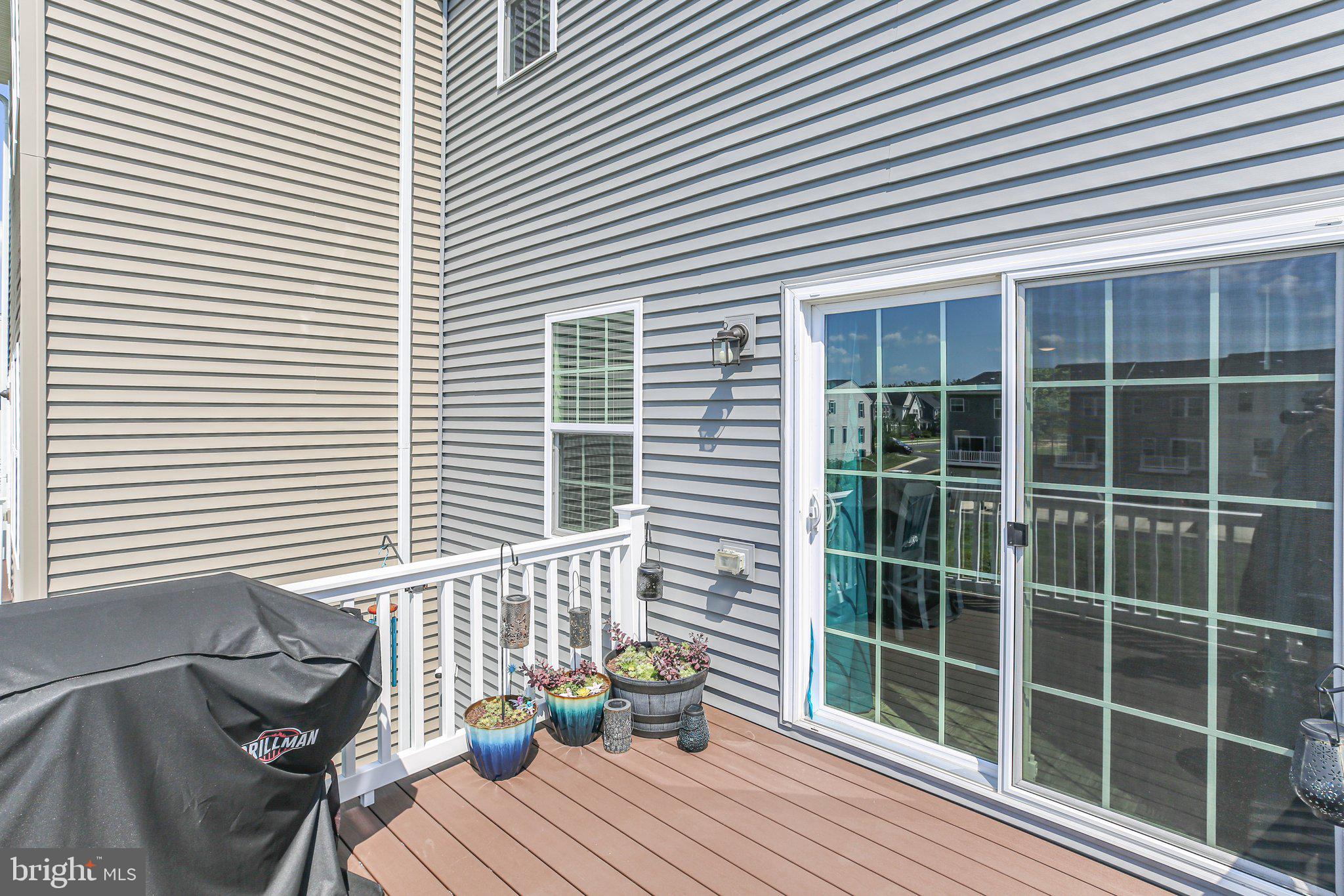 8410 Devries Lane Spotsylvania, VA 22553 - Photo 29 of 32 a view of a living room and a deck