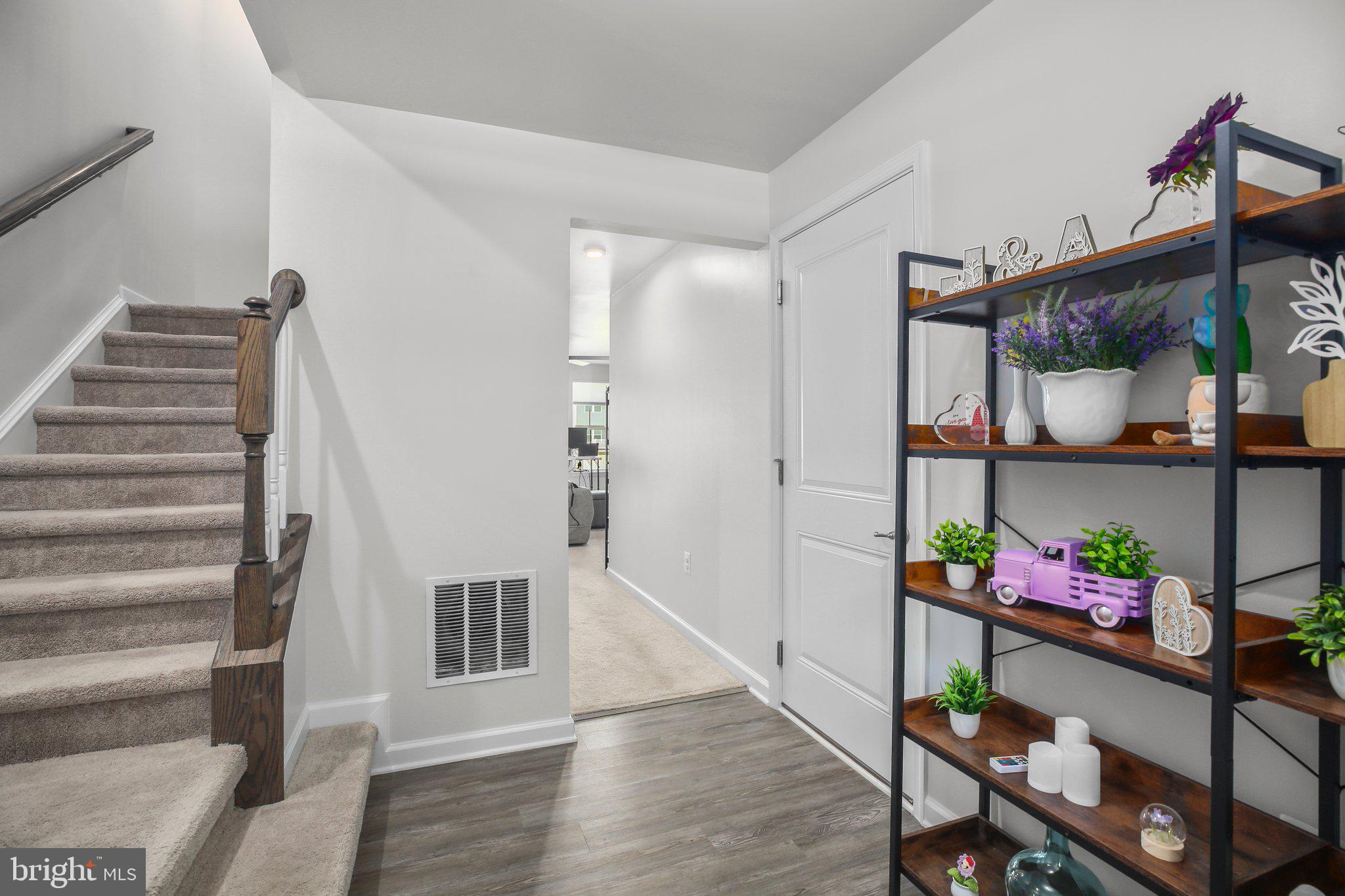 8410 Devries Lane Spotsylvania, VA 22553 - Photo 3 of 32 a view of entryway with wooden floor and stairs