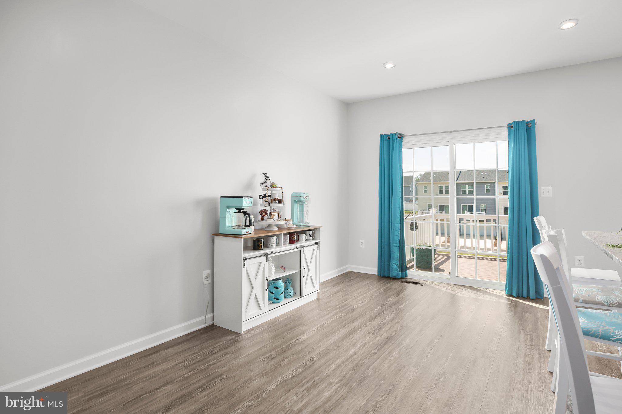 8410 Devries Lane Spotsylvania, VA 22553 - Photo 9 of 32 a living room with furniture and a wooden floor