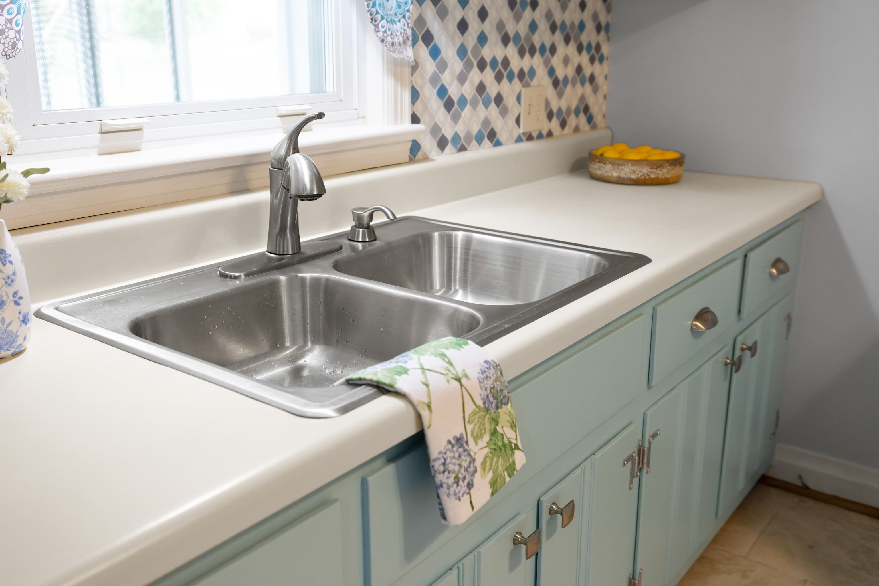 118 Stuart Avenue Stuarts Draft, VA 24477 - Photo 18 of 61 a close view of sink and tap