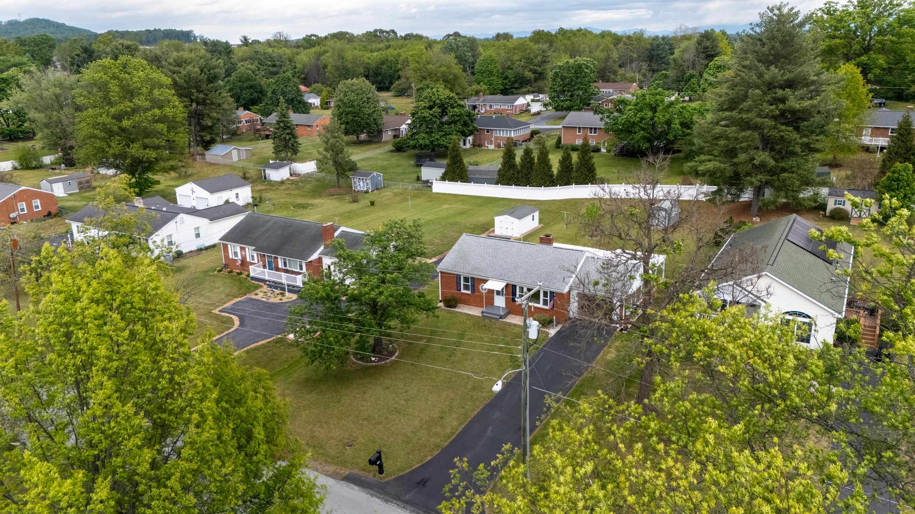 118 Stuart Avenue Stuarts Draft, VA 24477 - Photo 49 of 61 an aerial view of a house with a yard