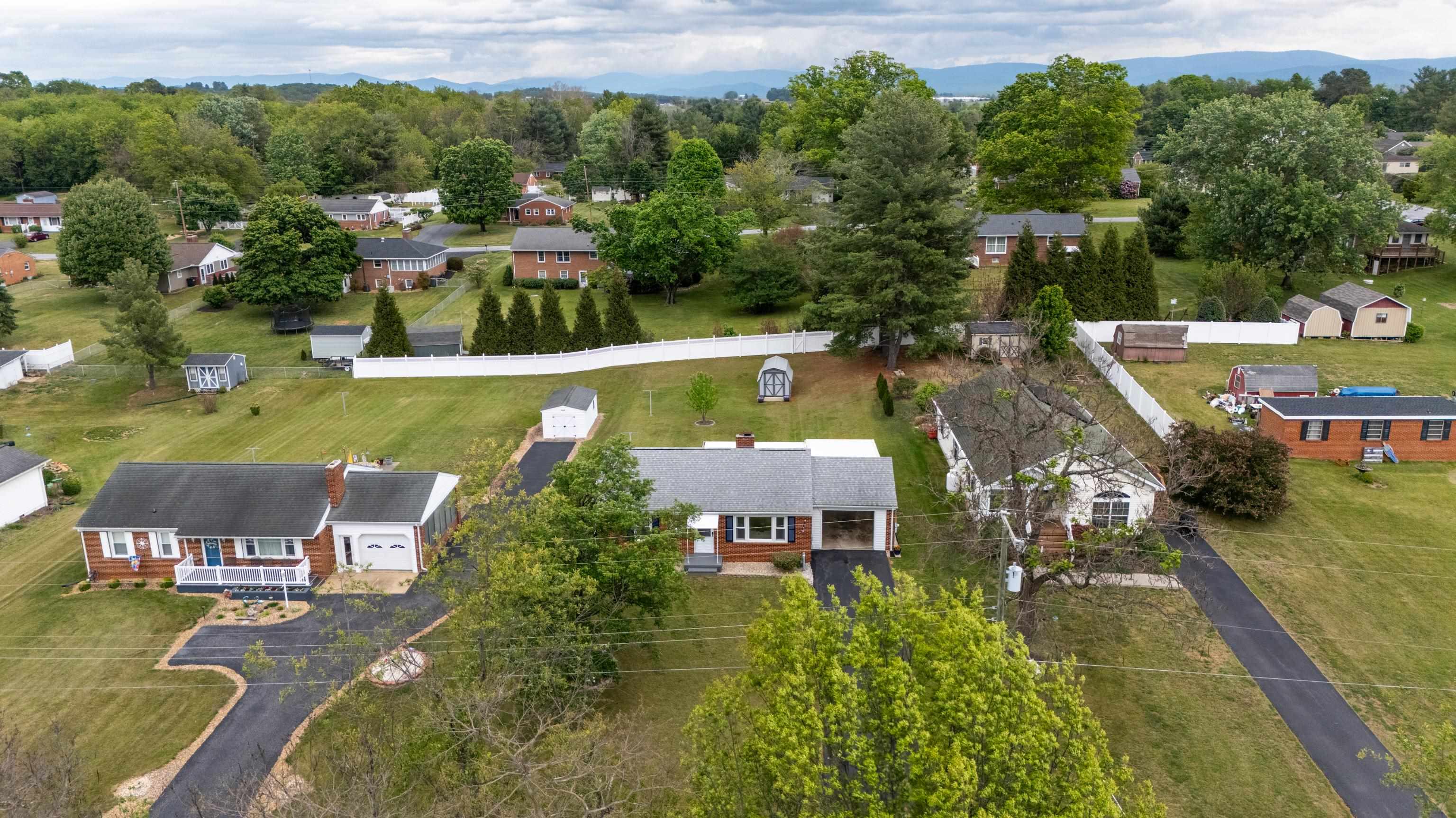 118 Stuart Avenue Stuarts Draft, VA 24477 - Photo 50 of 61 an aerial view of a house with garden space lake view and mountain view