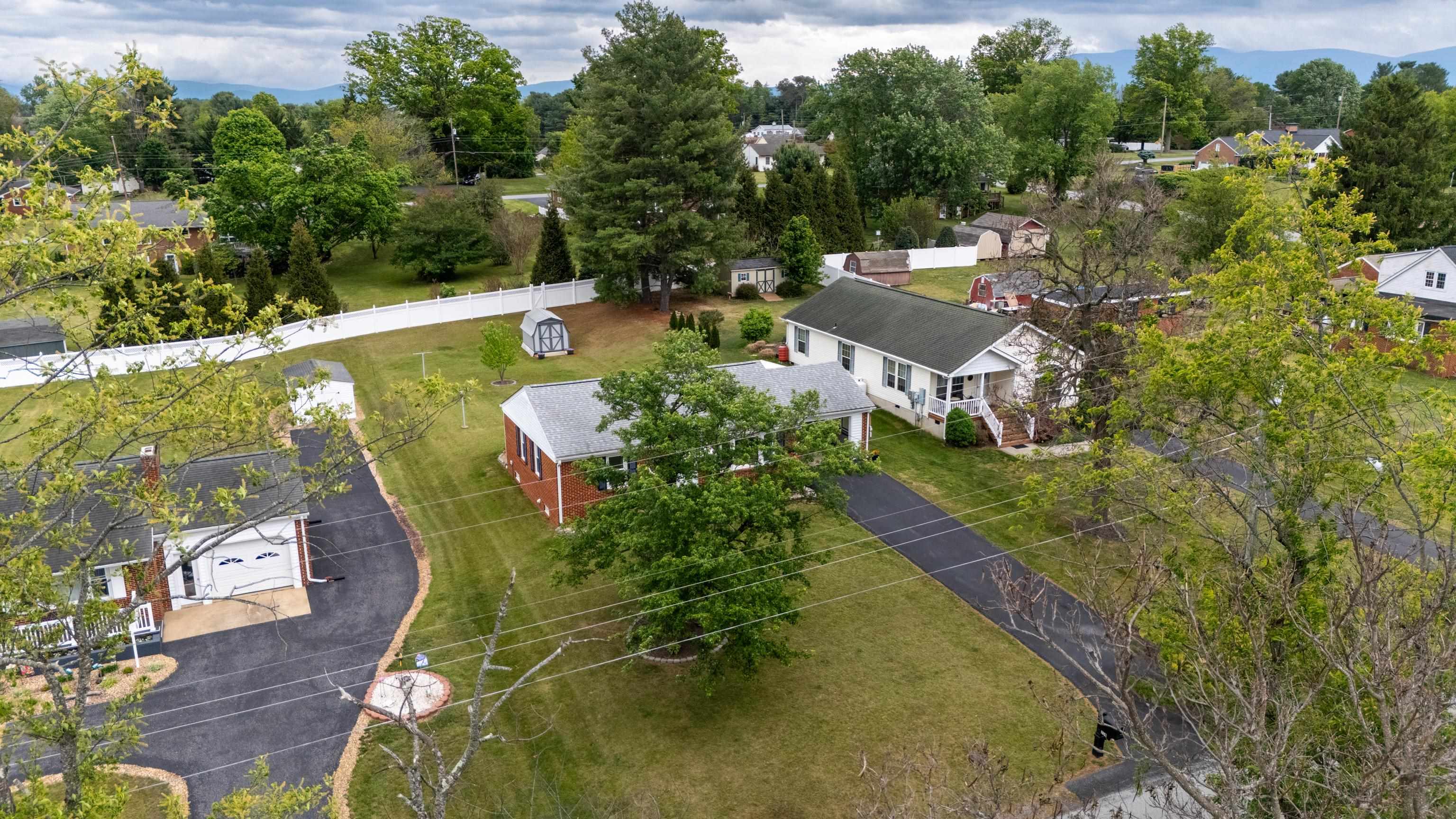 118 Stuart Avenue Stuarts Draft, VA 24477 - Photo 51 of 61 an aerial view of a house with garden space and street view
