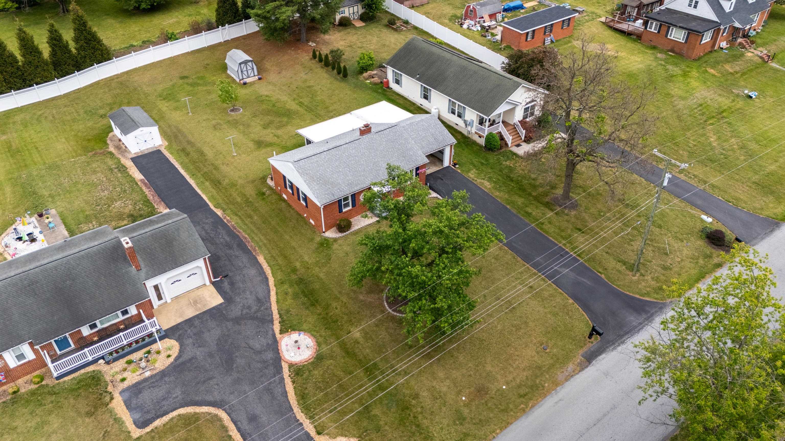 118 Stuart Avenue Stuarts Draft, VA 24477 - Photo 52 of 61 an aerial view of a house with a swimming pool