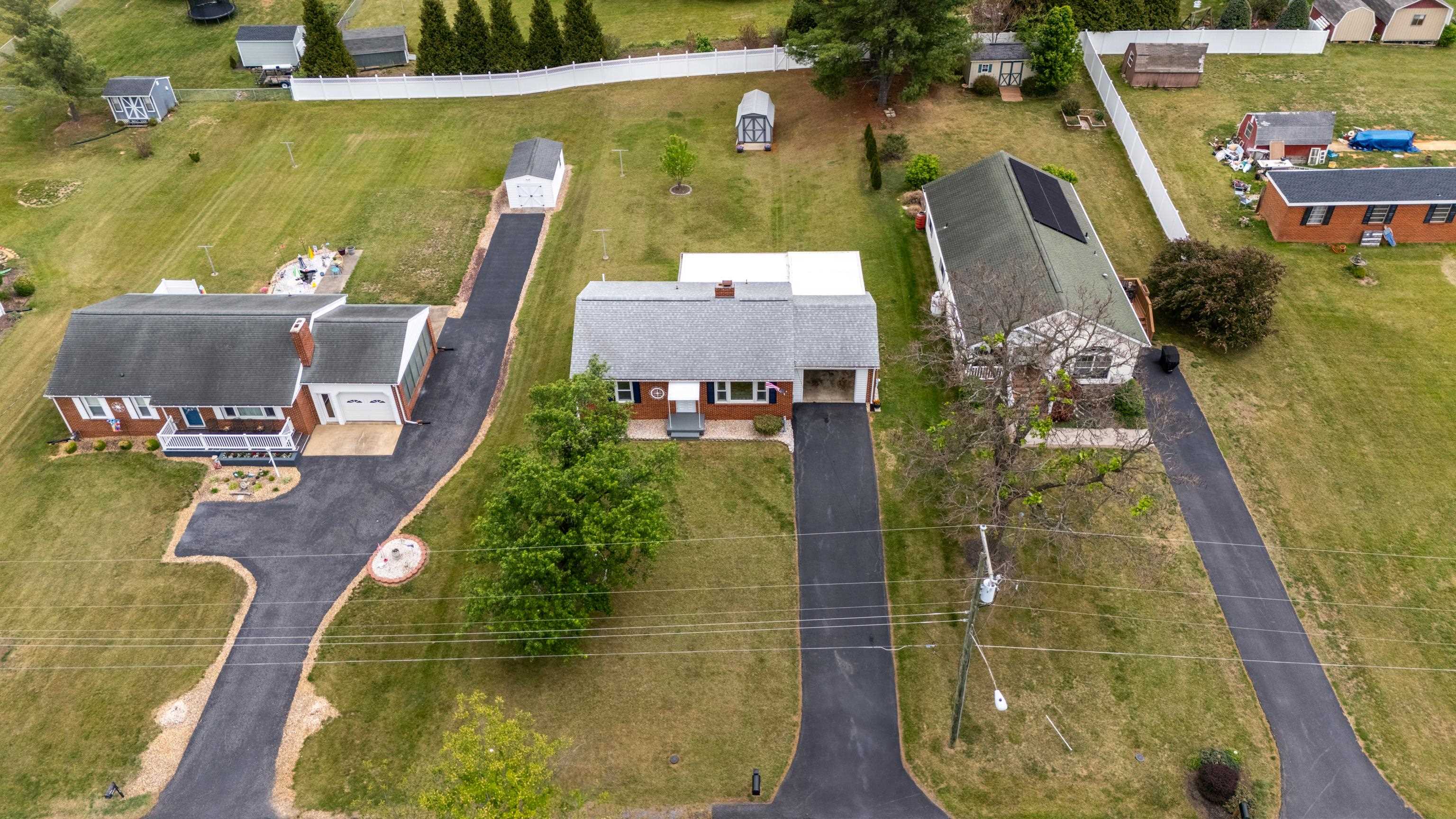 118 Stuart Avenue Stuarts Draft, VA 24477 - Photo 53 of 61 an aerial view of a house with a swimming pool