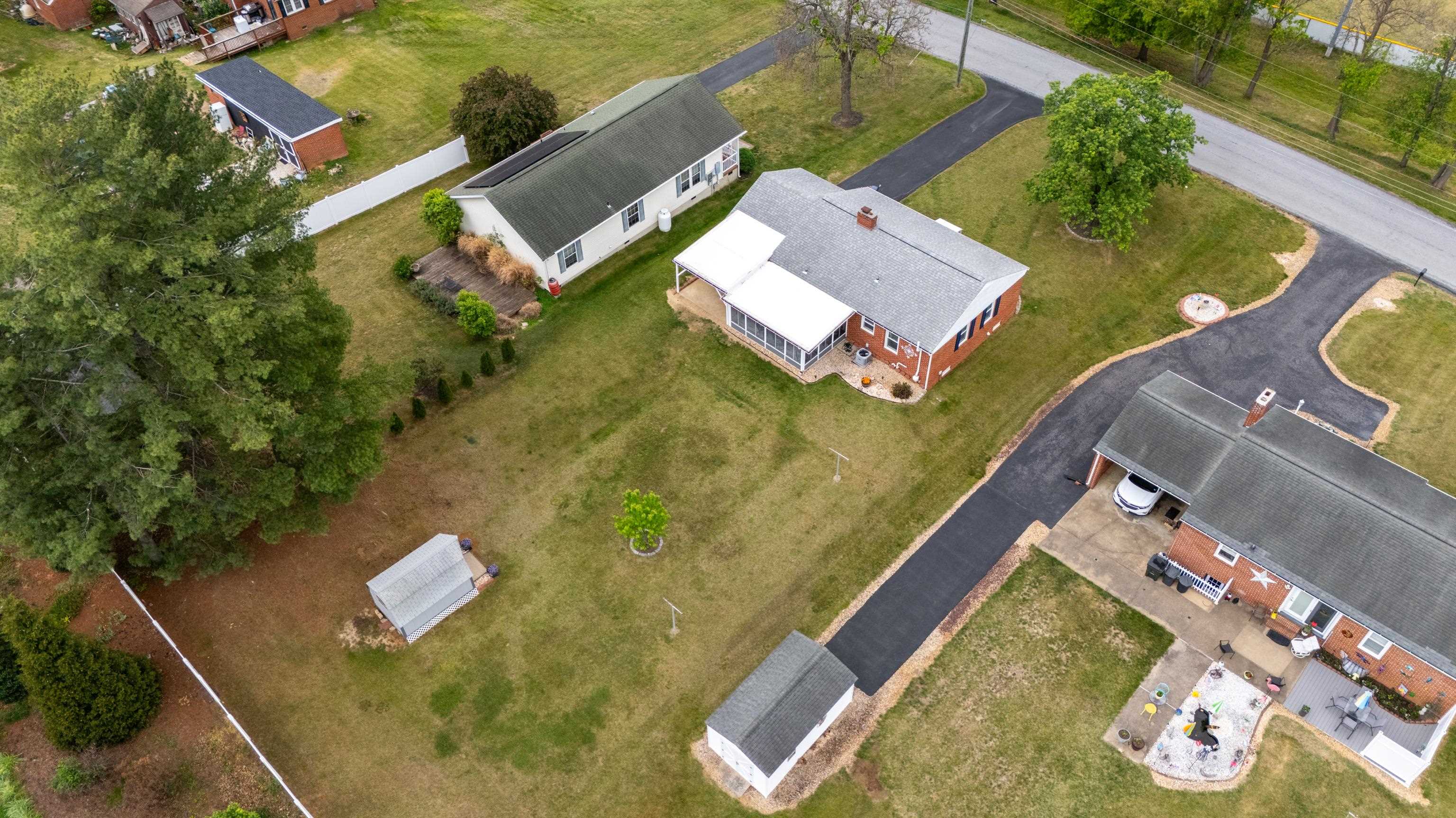 118 Stuart Avenue Stuarts Draft, VA 24477 - Photo 56 of 61 an aerial view of a house with a swimming pool