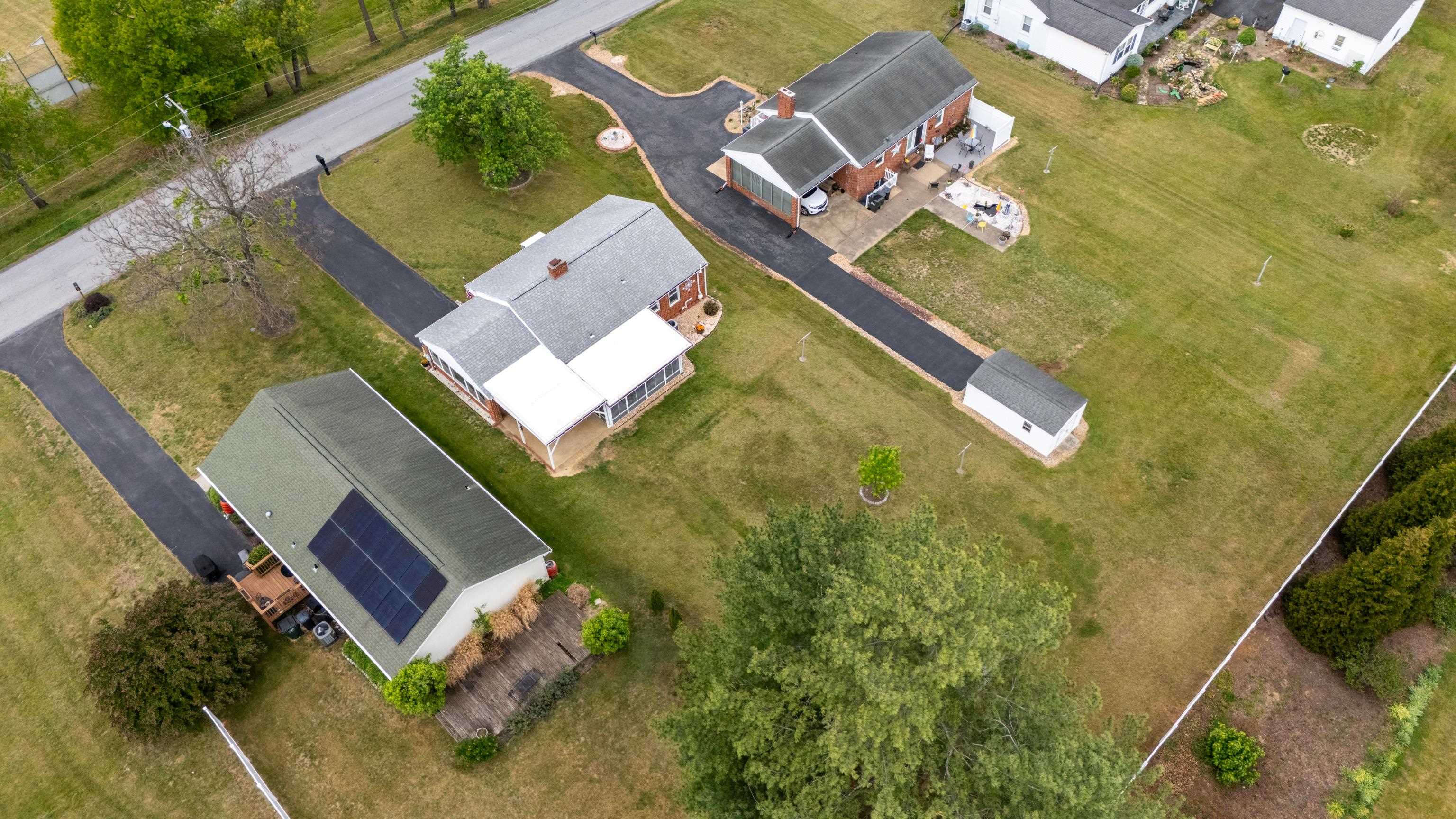 118 Stuart Avenue Stuarts Draft, VA 24477 - Photo 58 of 61 an aerial view of a house with swimming pool and outdoor space