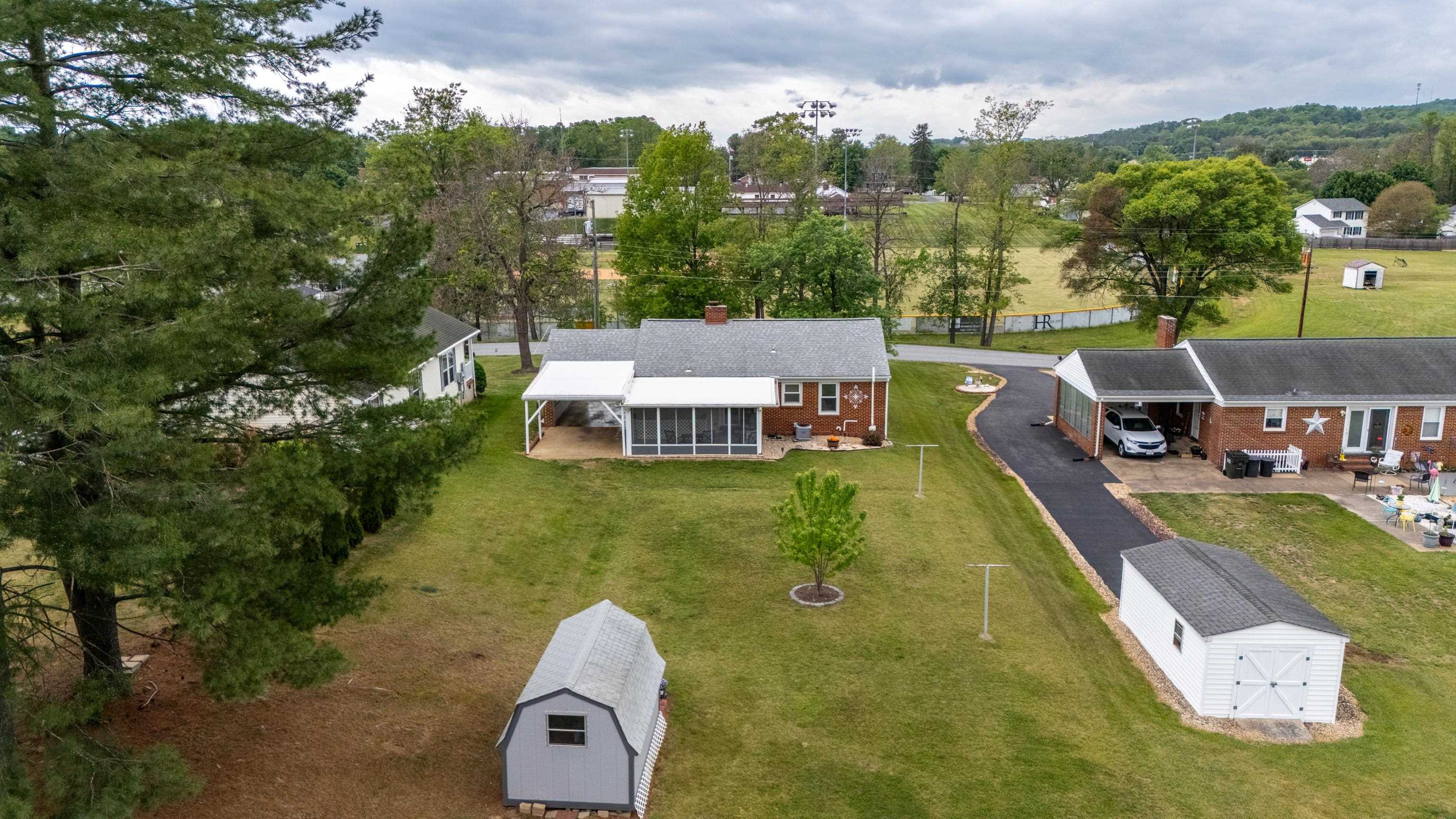 118 Stuart Avenue Stuarts Draft, VA 24477 - Photo 59 of 61 a view of a house with a yard