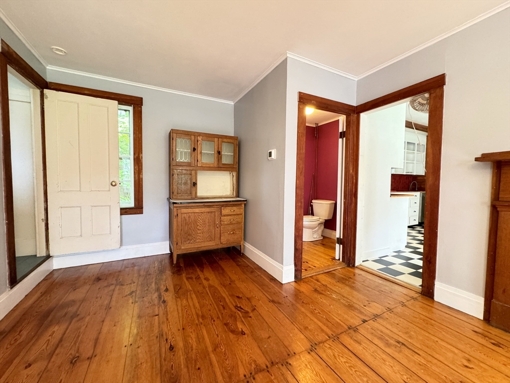 6 Pine Street Northfield, MA 01360 - Photo 21 of 42 a view of a kitchen with wooden floor and a refrigerator