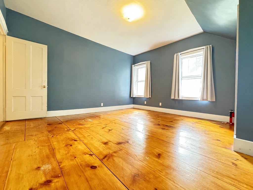 6 Pine Street Northfield, MA 01360 - Photo 34 of 42 a view of empty room with window and wooden floor