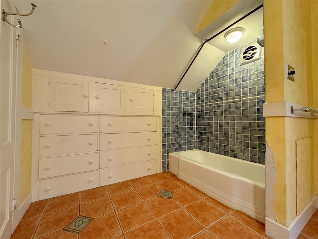 6 Pine Street Northfield, MA 01360 - Photo 36 of 42 a bathroom with a bathtub and shower