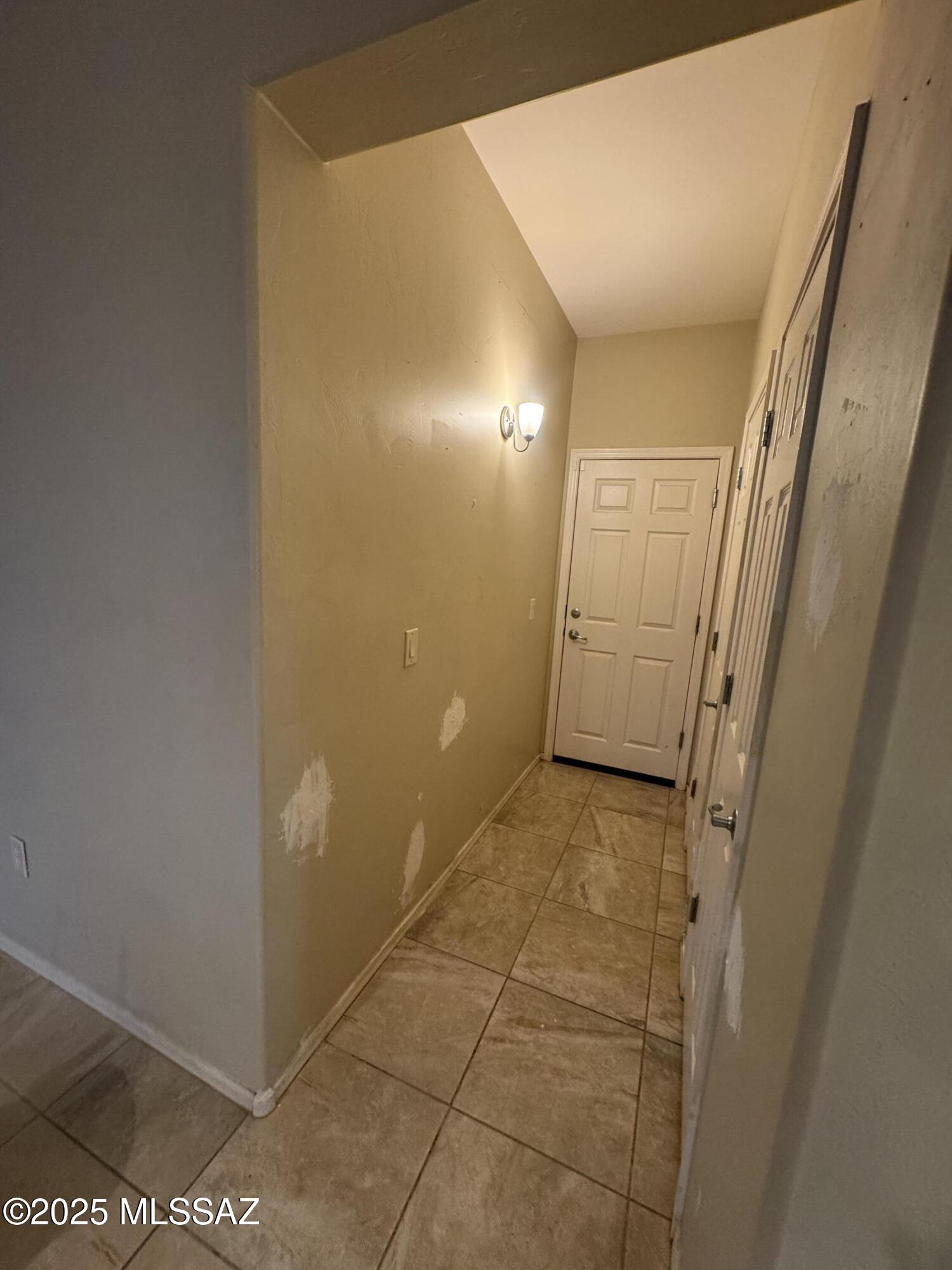 8697 West Denstone Road Marana, AZ 85653 - Photo 10 of 21 Hallway to the garage.