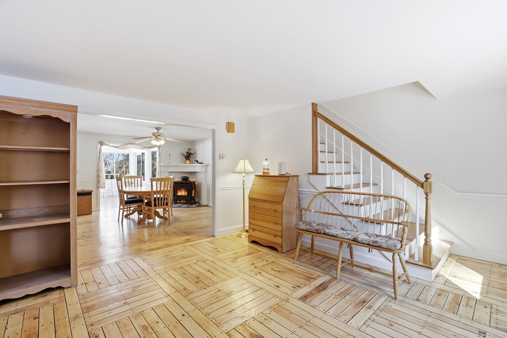 40 Fosdick Road Carver, MA 02330 - Photo 15 of 27 a view of a livingroom with furniture and a kitchen
