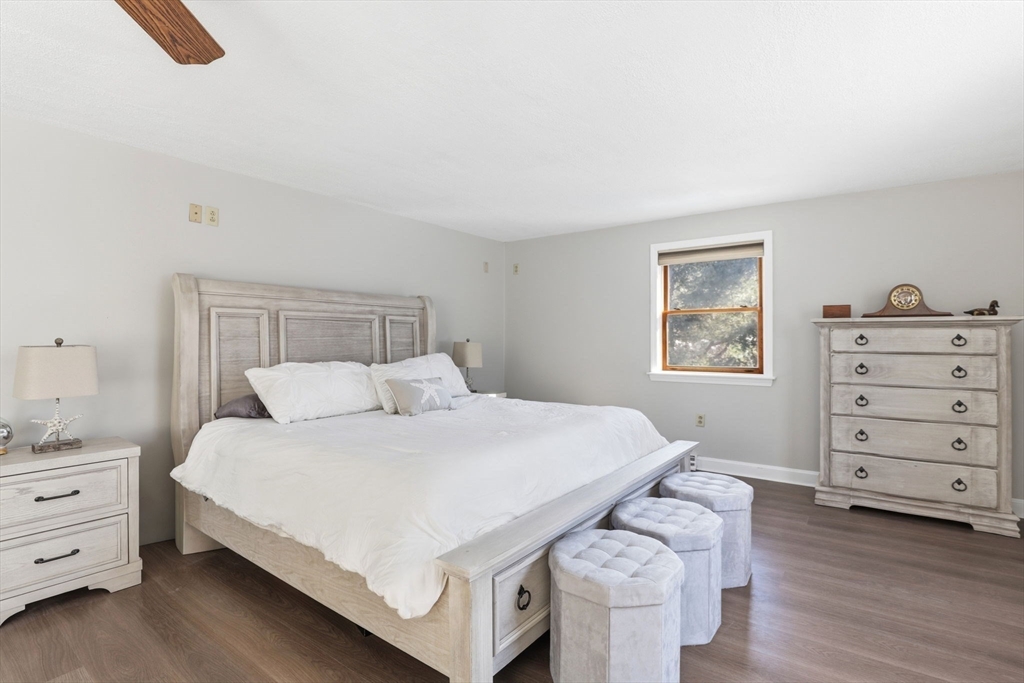 40 Fosdick Road Carver, MA 02330 - Photo 16 of 27 a bedroom with a bed and a dresser