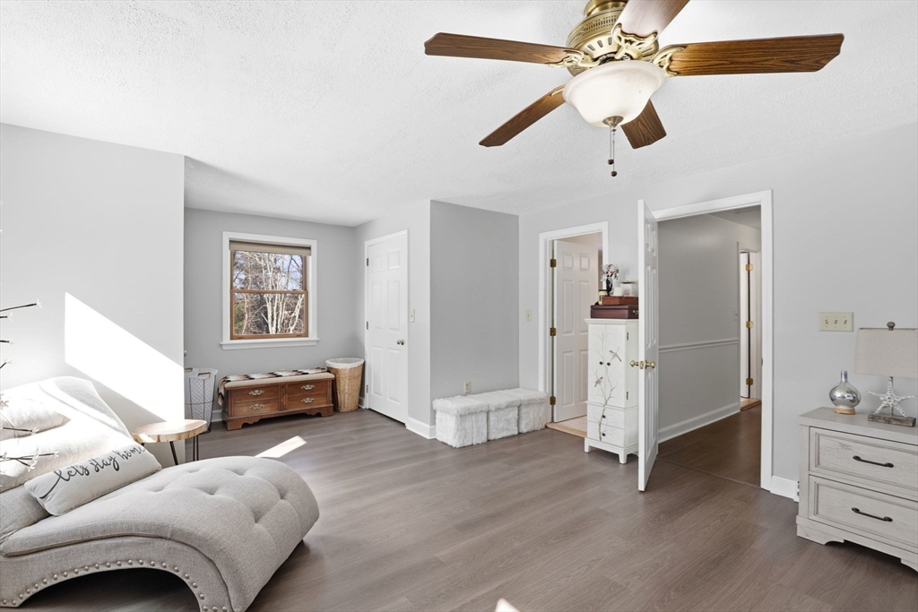 40 Fosdick Road Carver, MA 02330 - Photo 18 of 27 a living room with furniture and a ceiling fan