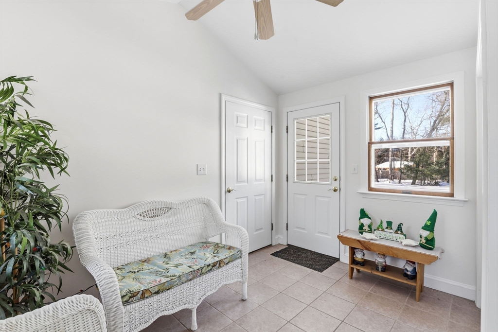40 Fosdick Road Carver, MA 02330 - Photo 2 of 27 a living room with furniture and a potted plant
