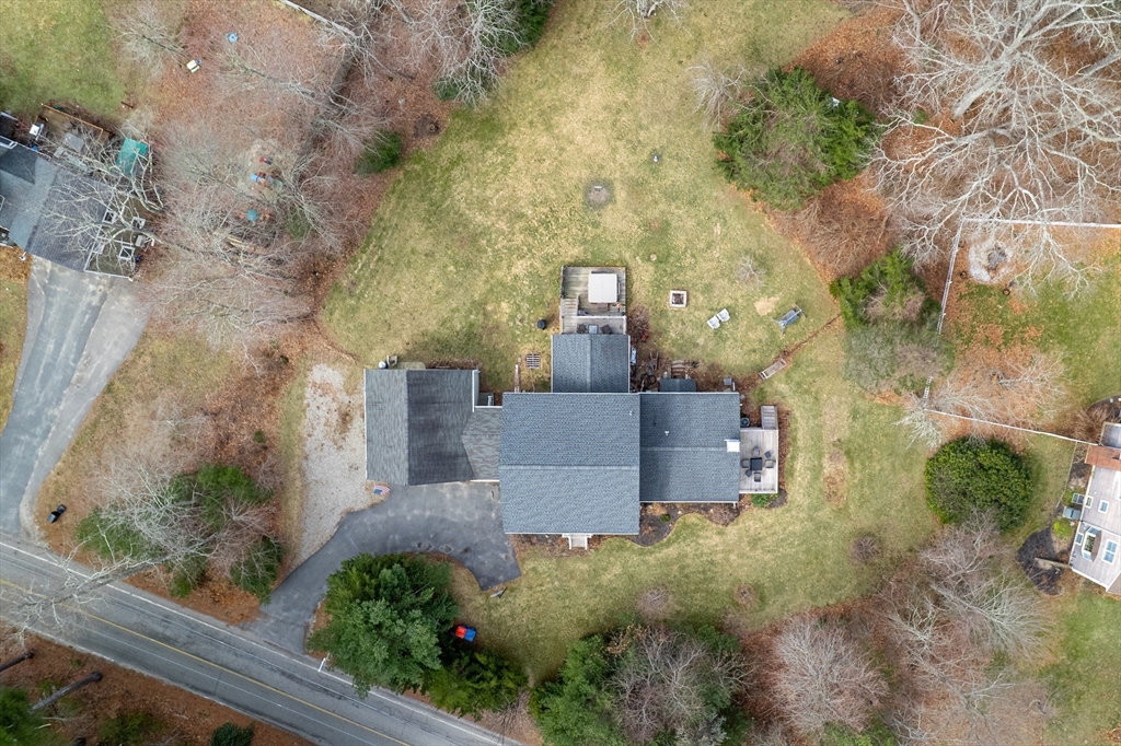 40 Fosdick Road Carver, MA 02330 - Photo 23 of 27 an aerial view of a house with a yard