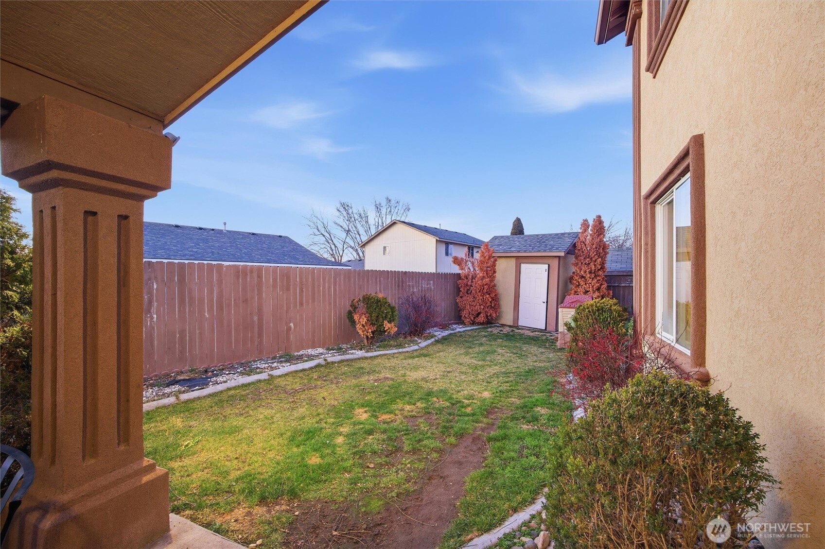 5008 Polo Lane Pasco, WA 99301 - Photo 6 of 26 a view of a backyard with a garden