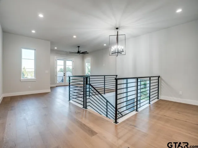 an entryway in a hall with a window