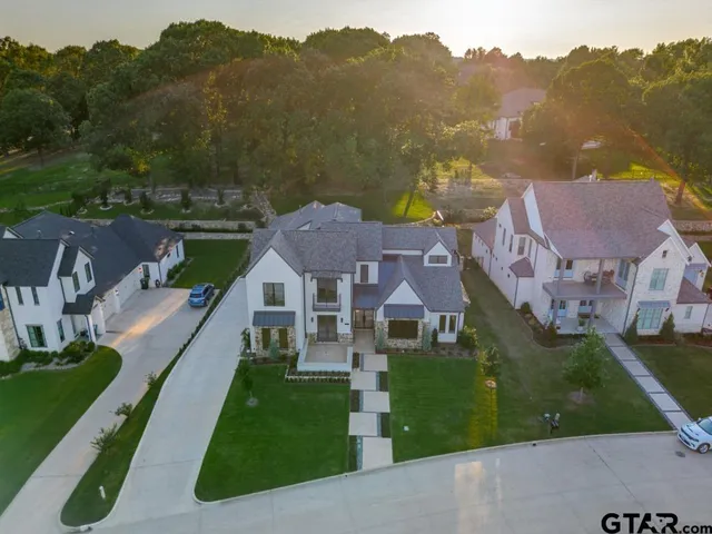 an aerial view of house swimming pool and outdoor space