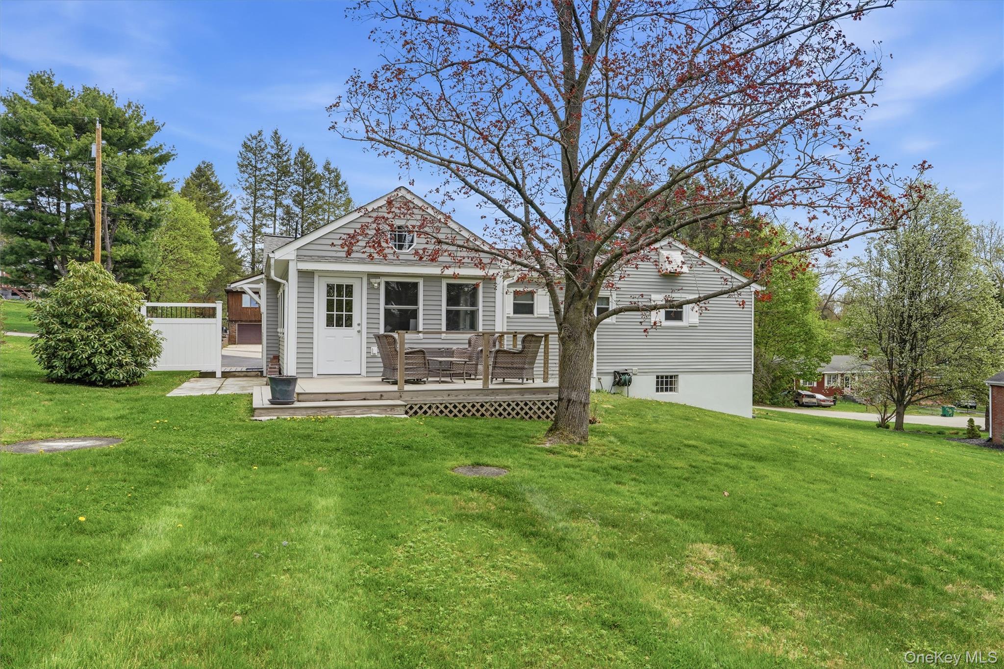 6 Willow Lane Fishkill, NY 12524 - Photo 31 of 33 a front view of a house with a yard porch and tree