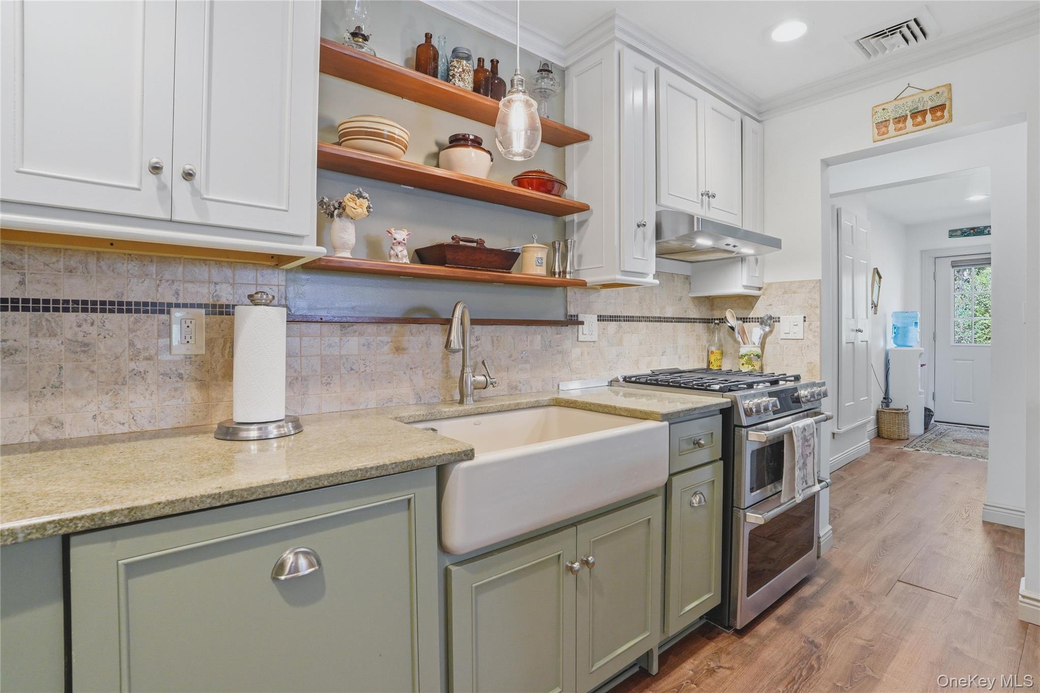 6 Willow Lane Fishkill, NY 12524 - Photo 4 of 33 a kitchen with stainless steel appliances granite countertop a sink and cabinets