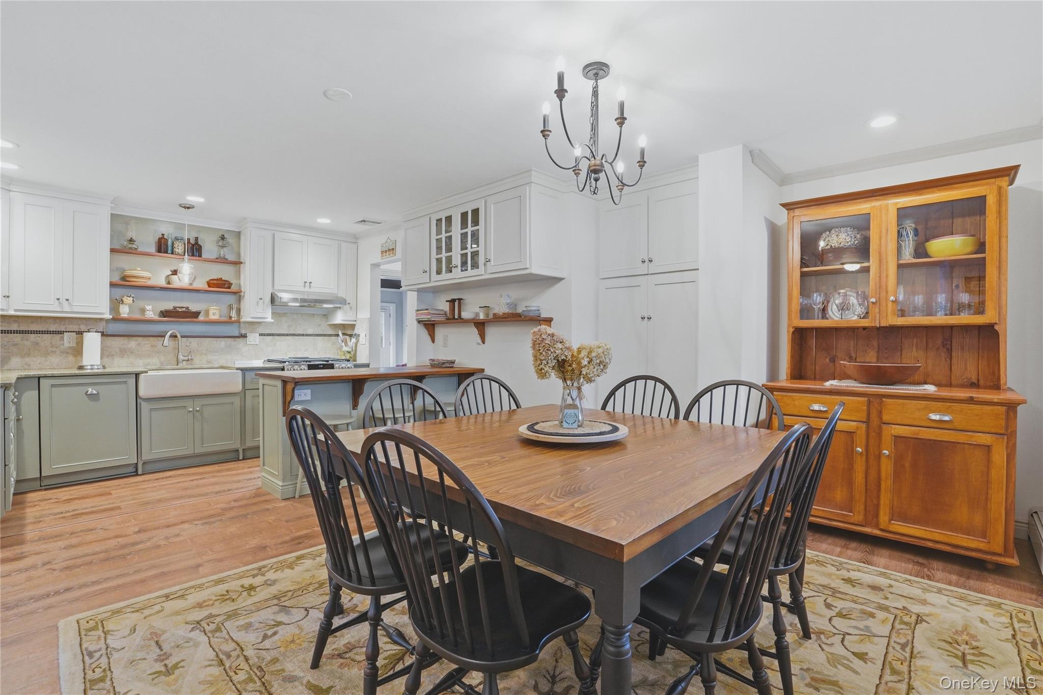 6 Willow Lane Fishkill, NY 12524 - Photo 10 of 33 a view of a dining room with furniture a kitchen and chandelier