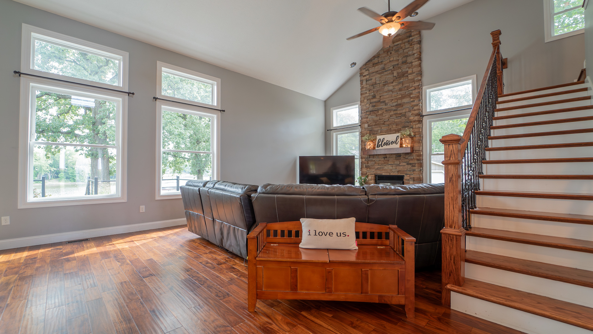 2611 2560 River Road Kankakee, IL 60901 - Photo 15 of 53 a living room with furniture and a flat screen tv