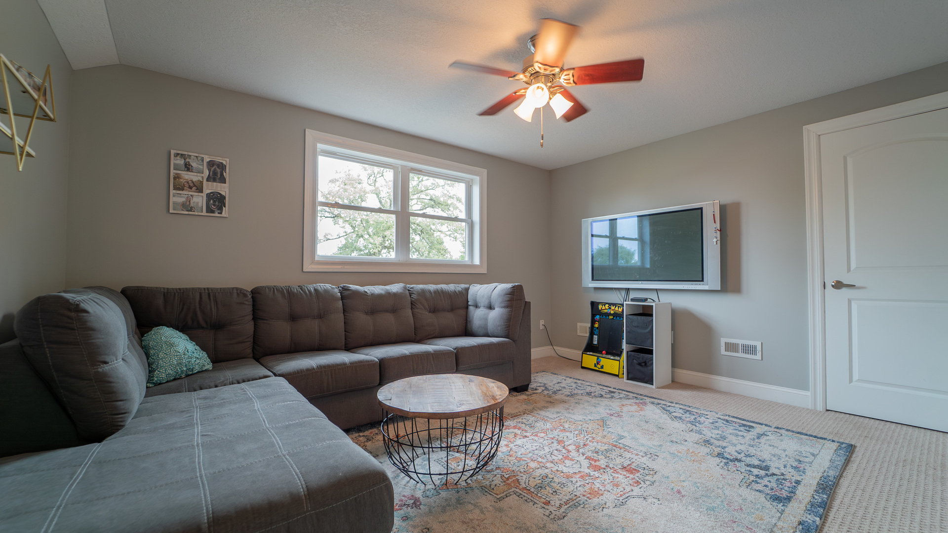 2611 2560 River Road Kankakee, IL 60901 - Photo 30 of 53 a living room with furniture and a flat screen tv