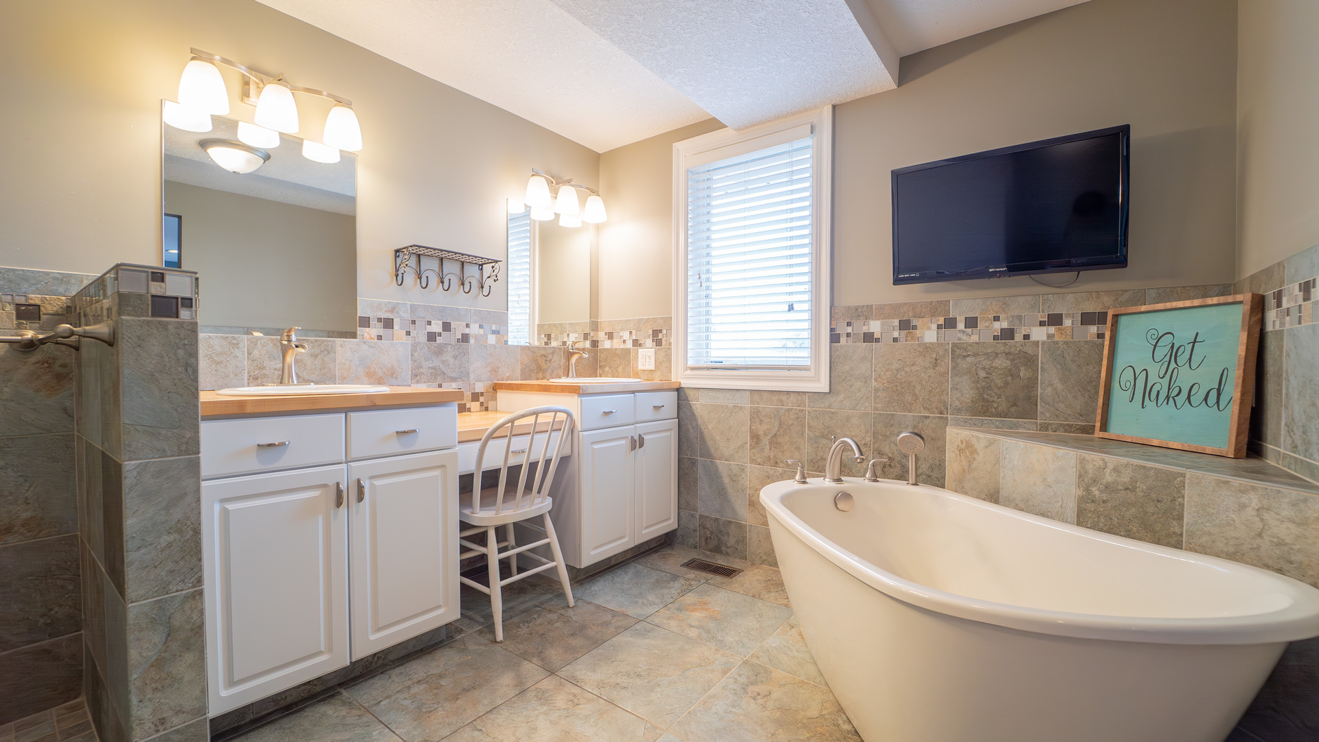 2611 2560 River Road Kankakee, IL 60901 - Photo 35 of 53 a bathroom with a sink a toilet and mirror