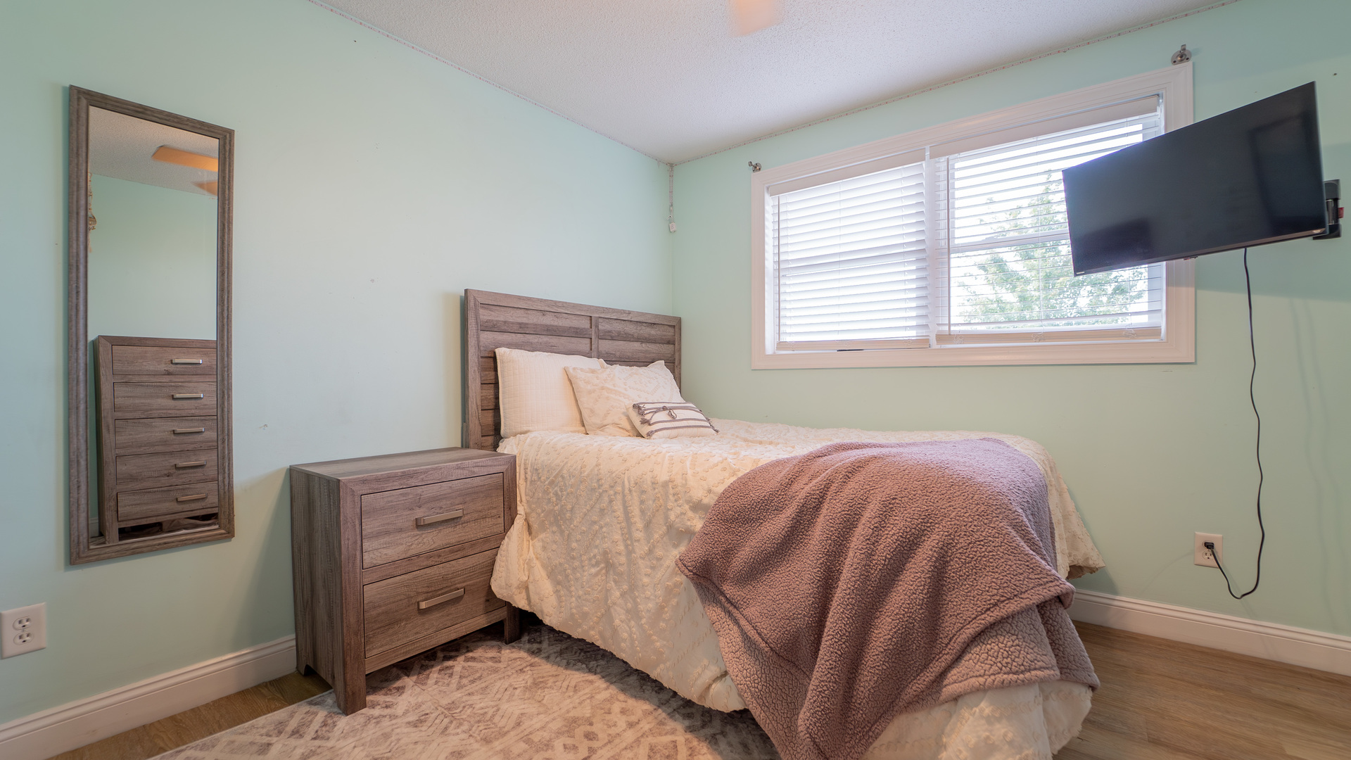 2611 2560 River Road Kankakee, IL 60901 - Photo 37 of 53 a bedroom with a bed and a flat screen tv