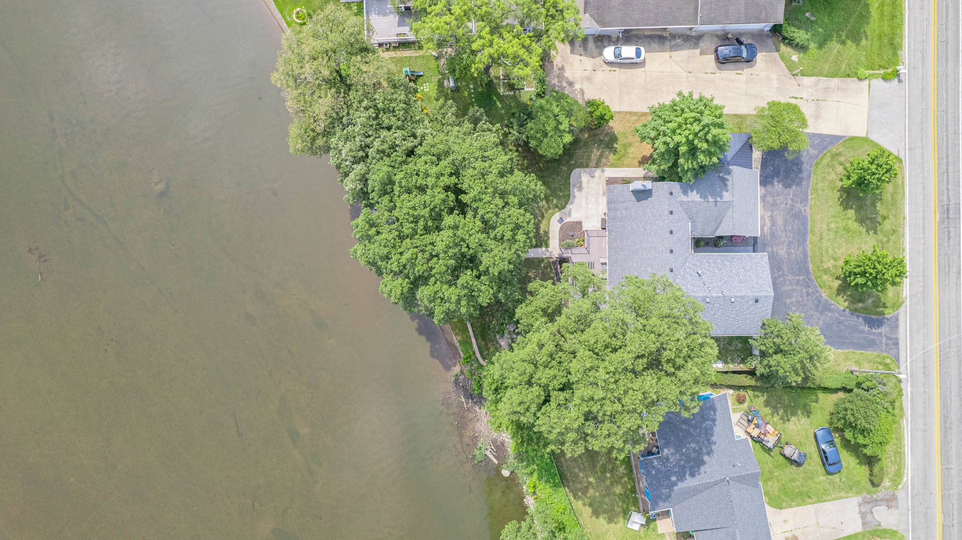 2611 2560 River Road Kankakee, IL 60901 - Photo 50 of 53 an aerial view of a house with a yard and green space