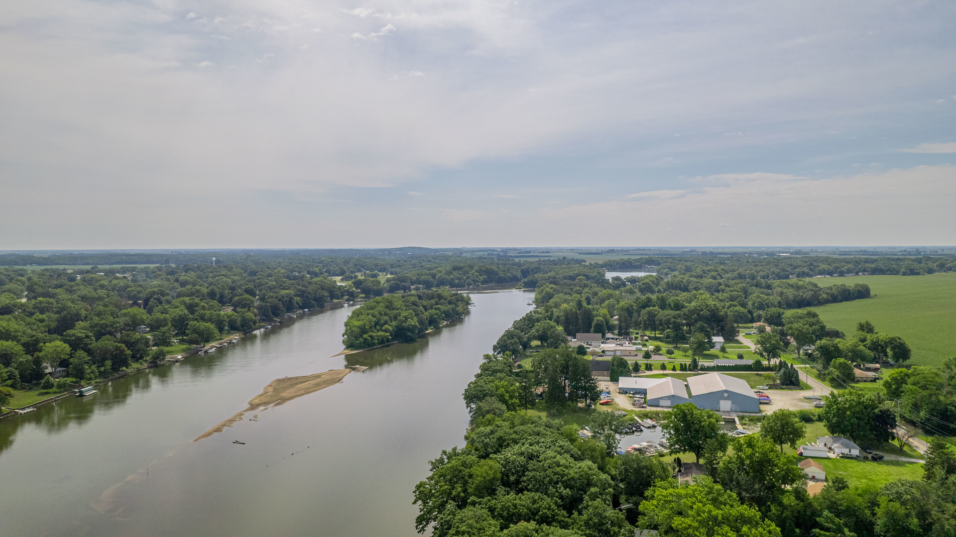 2611 2560 River Road Kankakee, IL 60901 - Photo 51 of 53 a view of a lake with houses in back