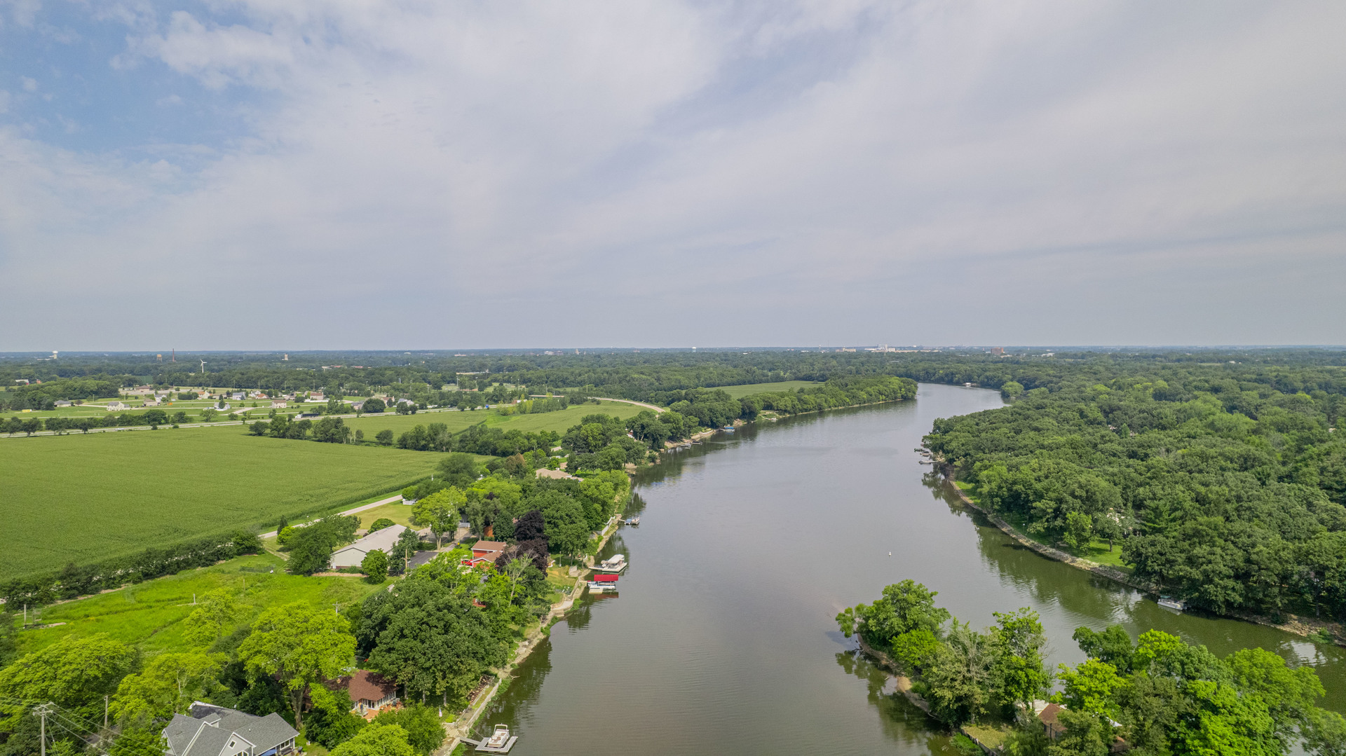2611 2560 River Road Kankakee, IL 60901 - Photo 52 of 53 an aerial view of a houses with a yard and lake view