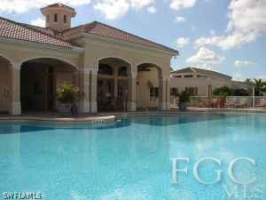 11729 Eros Road Lehigh Acres, FL 33971 - Photo 2 of 10 a view of a house with a swimming pool