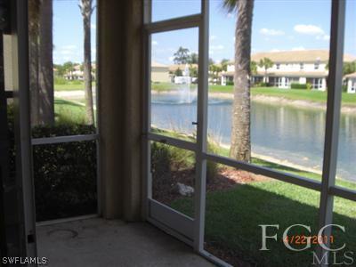 11729 Eros Road Lehigh Acres, FL 33971 - Photo 7 of 10 a window of lake from a window