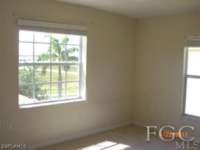 11729 Eros Road Lehigh Acres, FL 33971 - Photo 9 of 10 a view of a window in an empty room