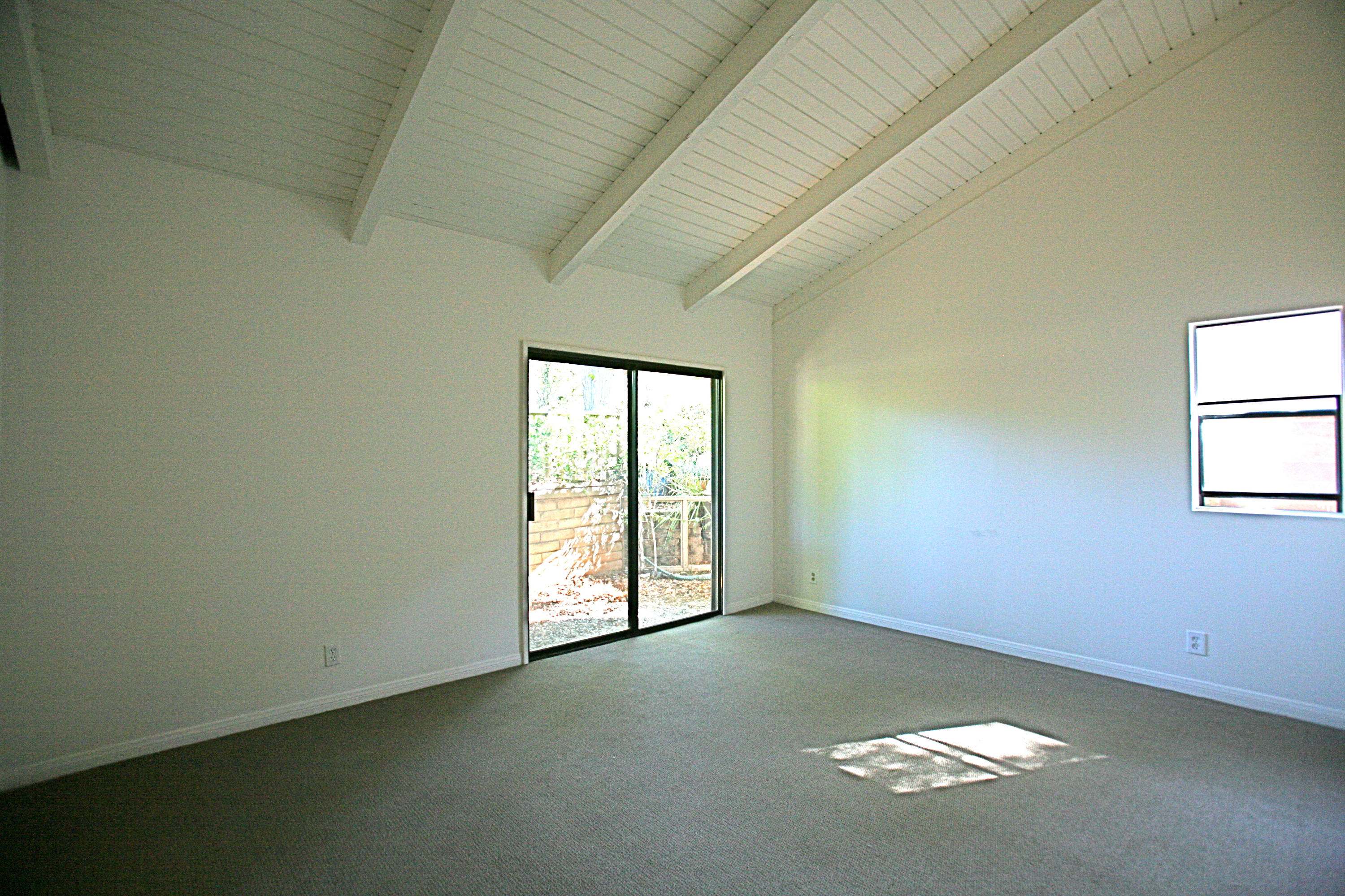 561 North La Cumbre Road Santa Barbara, CA 93110 - Photo 7 of 12 an empty room with windows