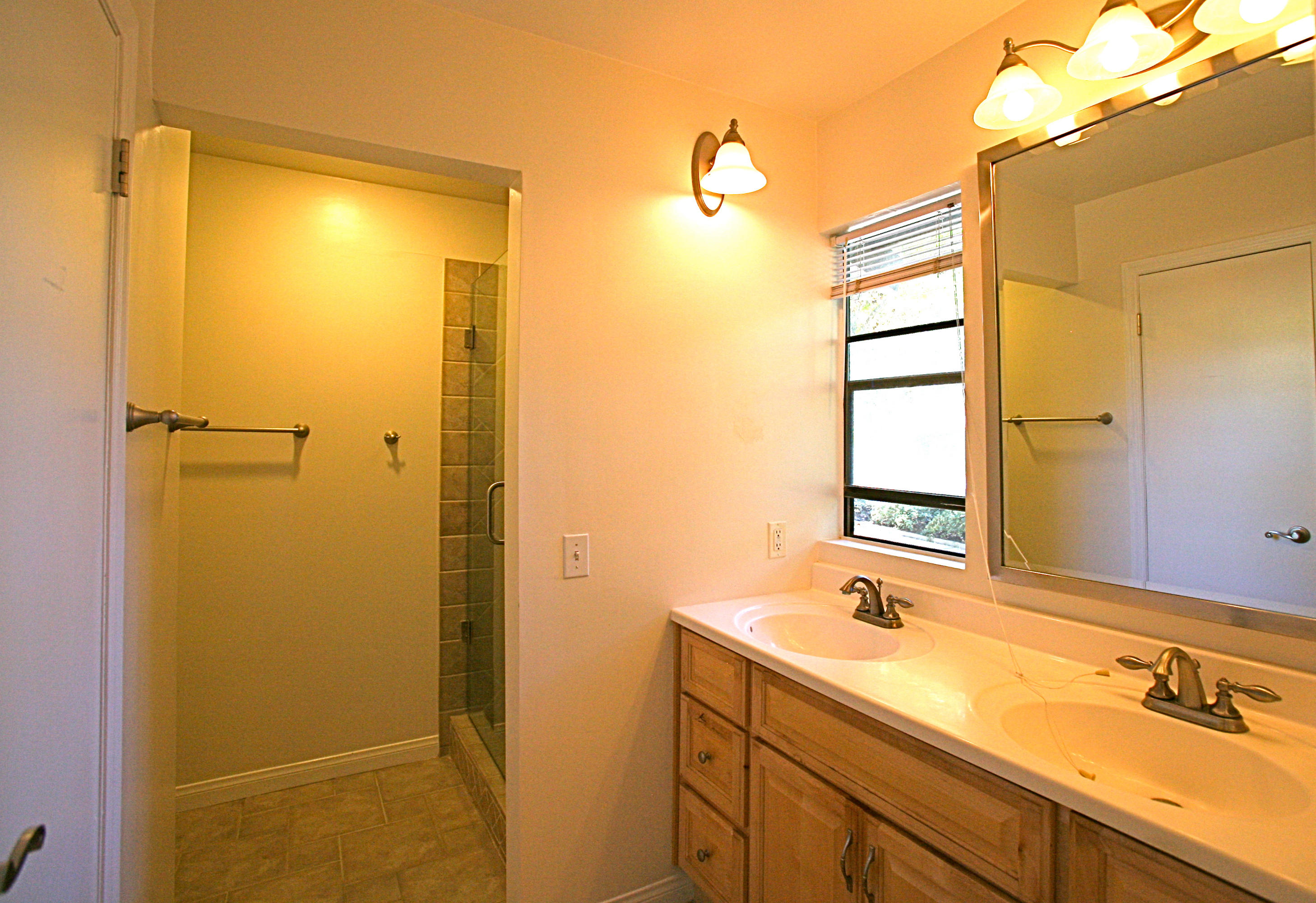 561 North La Cumbre Road Santa Barbara, CA 93110 - Photo 8 of 12 a bathroom with a sink and a mirror