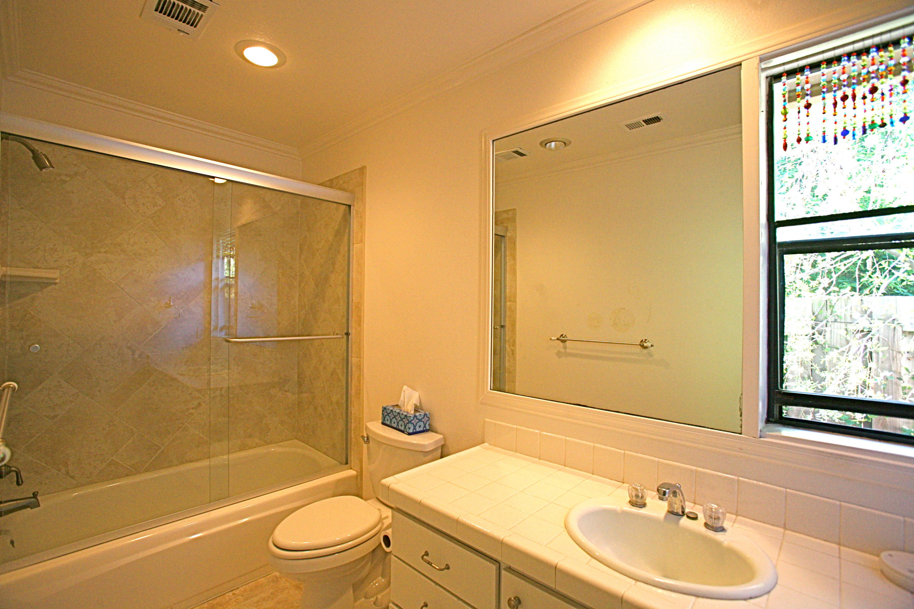 561 North La Cumbre Road Santa Barbara, CA 93110 - Photo 10 of 12 a bathroom with a sink mirror toilet and bathtub